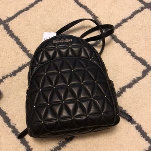 Michael Kors Black leather tufted backpack NWT